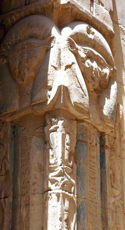 Column, representing Hathor, within the temple that frame the entrances to the Chapels.  This one is on the very left side of the Vestibule.