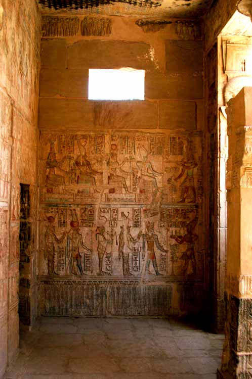 In the vestibule with the door to the last Chapel to the left and the entrance to the Courtyard to the right.  Scenes of Ptolemy offering to various Gods.