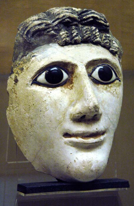 funerary mask of a woman; plaster with inlaid eyes of glass and marble